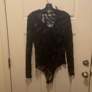 Sheer high cut body suit